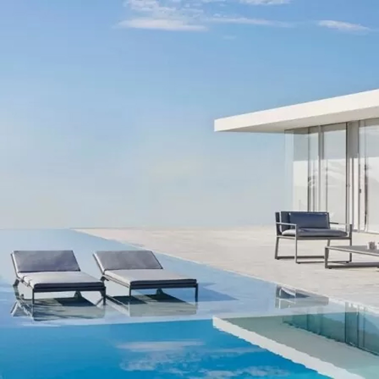 gandiablasco blau lounge set + loungers grey along pool and house