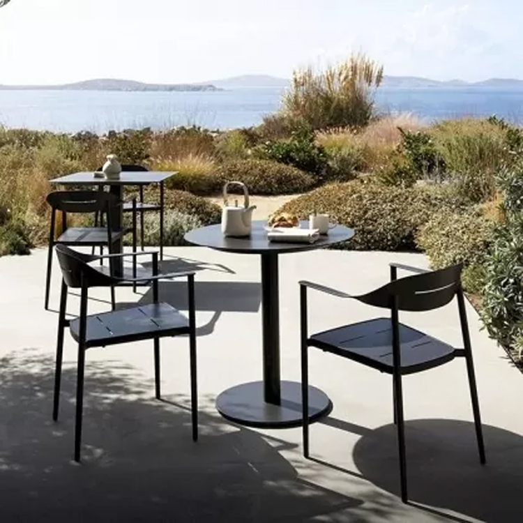 kudos garden chair with table black back view on terrace along great sea